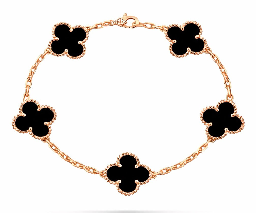 Pulsera Vnc negra con oro rosa