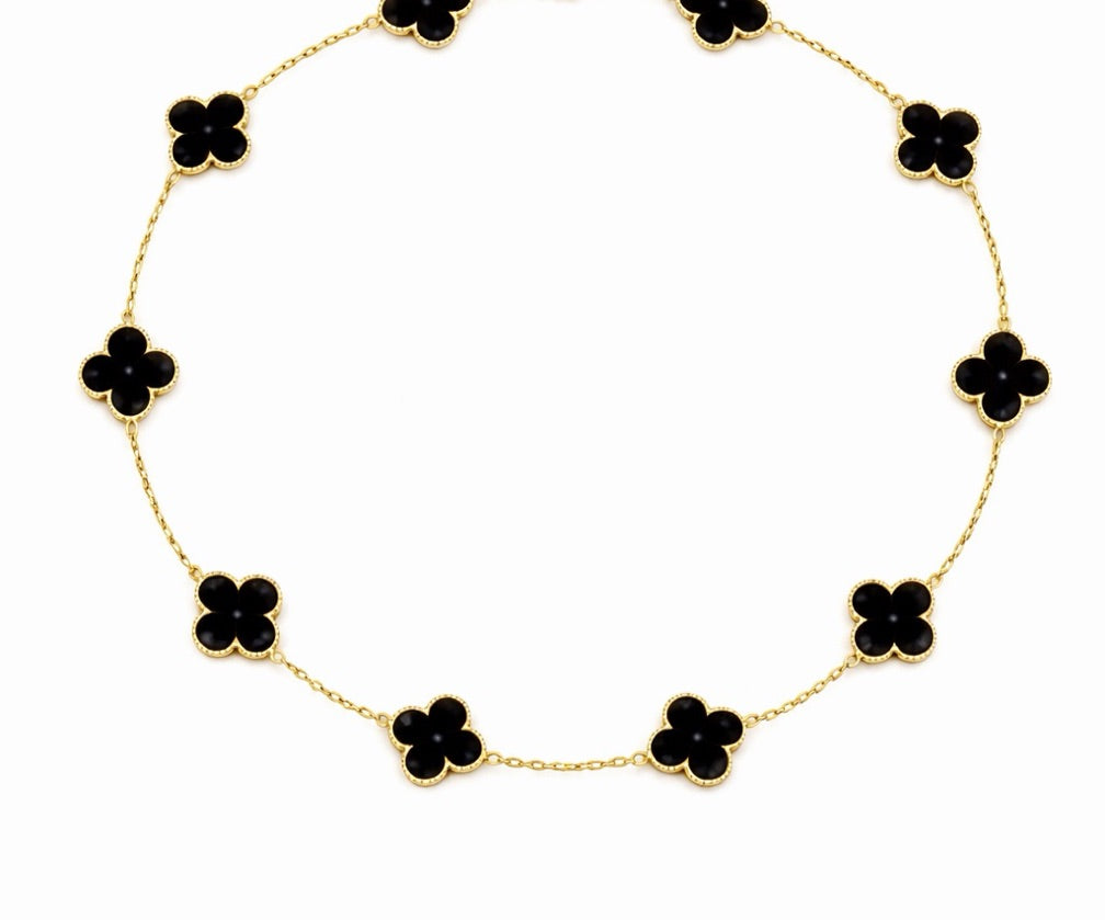 Collar Vnc negro con dorado